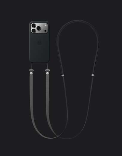 iPhone 17 Pro, екстериорен изглед отзад, сребърно, с черен Силиконов кейс с MagSafe и прикрепена тъмносива презрамка