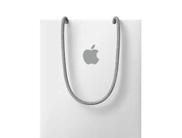 Apple 白色購物袋，袋身近開口處有 Apple 標誌